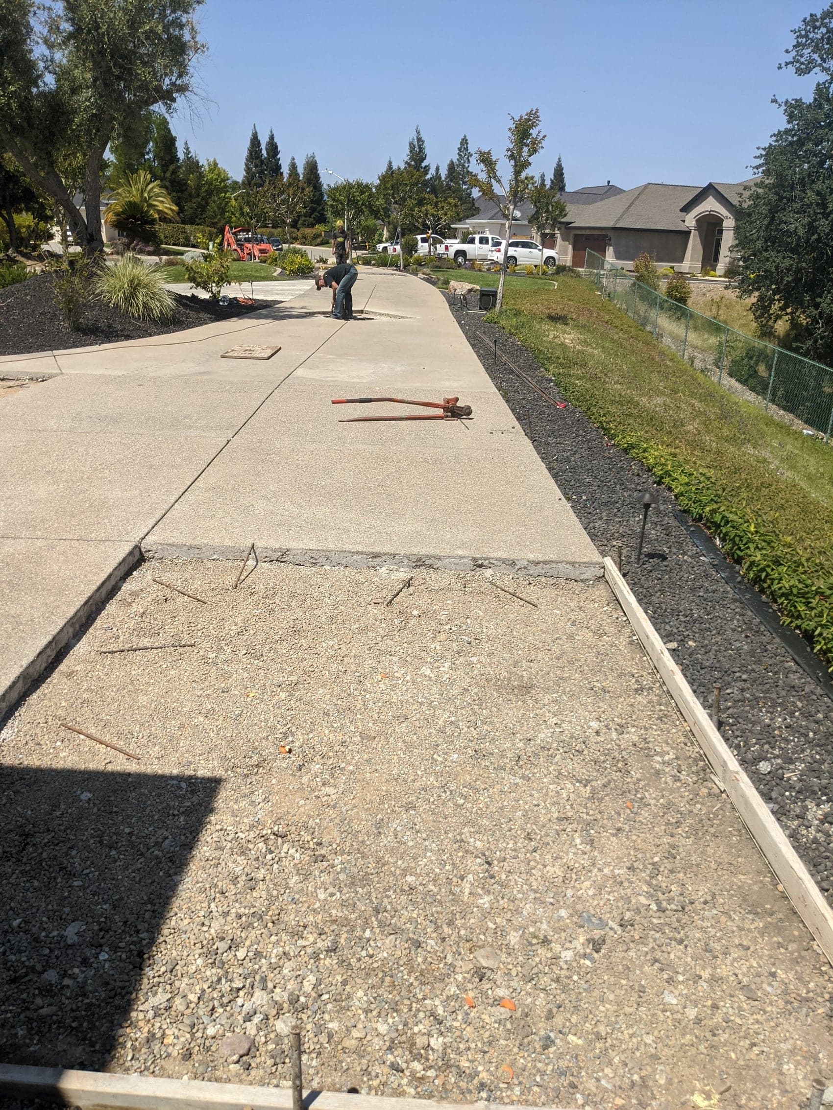 A walkway formed and based, ready for the pour, running along the front of a property